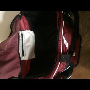 burgundy nike duffel bag